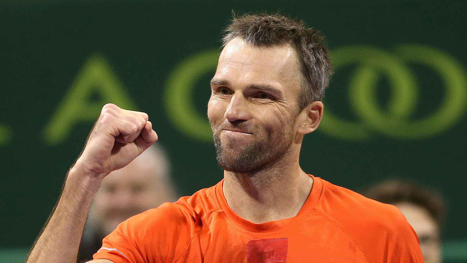 Ivo Karlovic savors the moment after upsetting World No. 1 Novak Djokovic 6-7, 7-6, 6-4 in Doha.